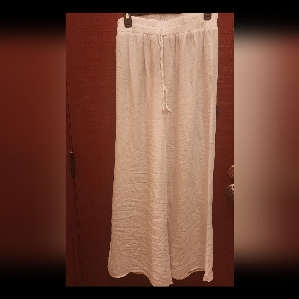 New Beach Cover Up White Wide leg Pants. Size M Fits L. Sheer Quality Fabric.